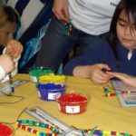 Travel with kids: activity - making bracelets