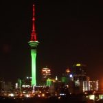 Sky Tower in Auckland, New Zealand, illuminated the skyline in Christmas colours in December
